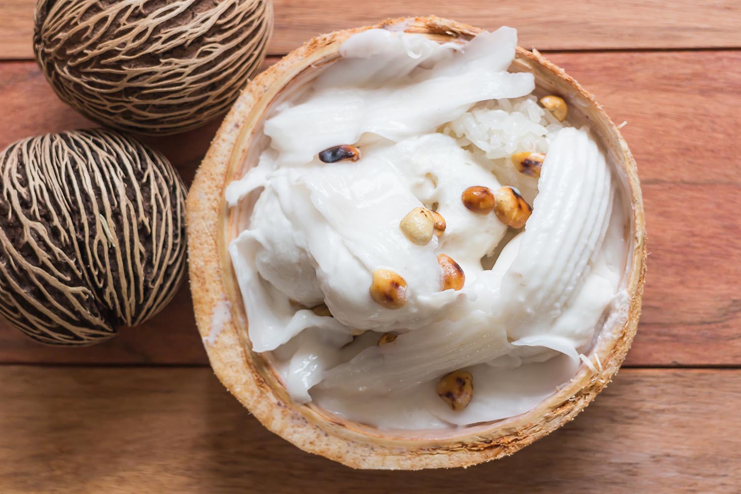 Coconut Ice Cream top view wood background / Food Stylist