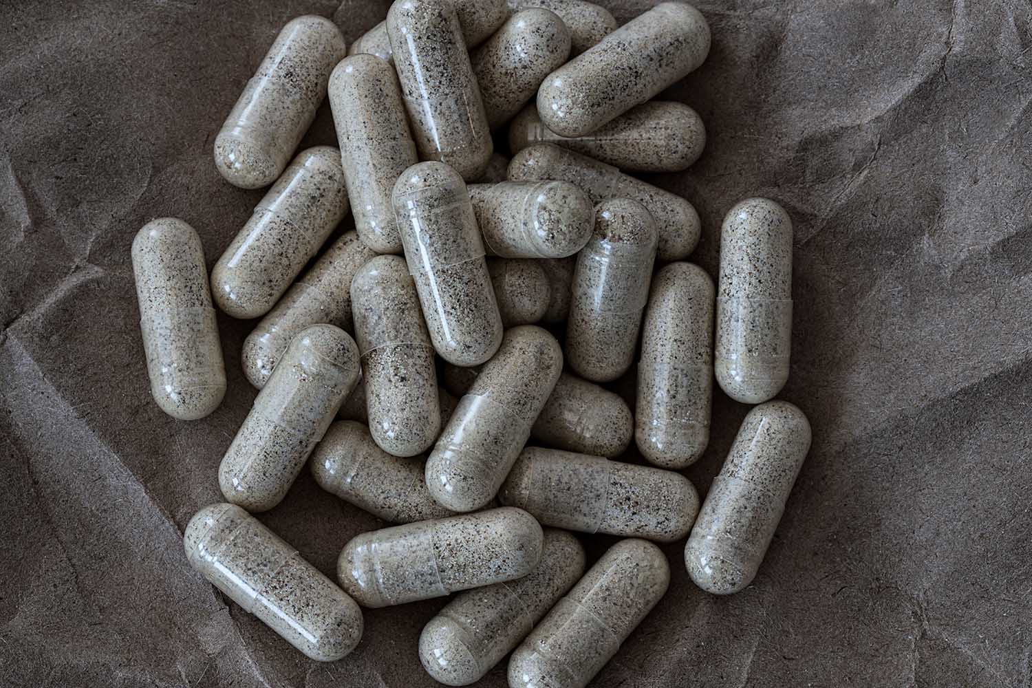 close-up of super enzymes capsules. dietary concept. dietary supplement topview.