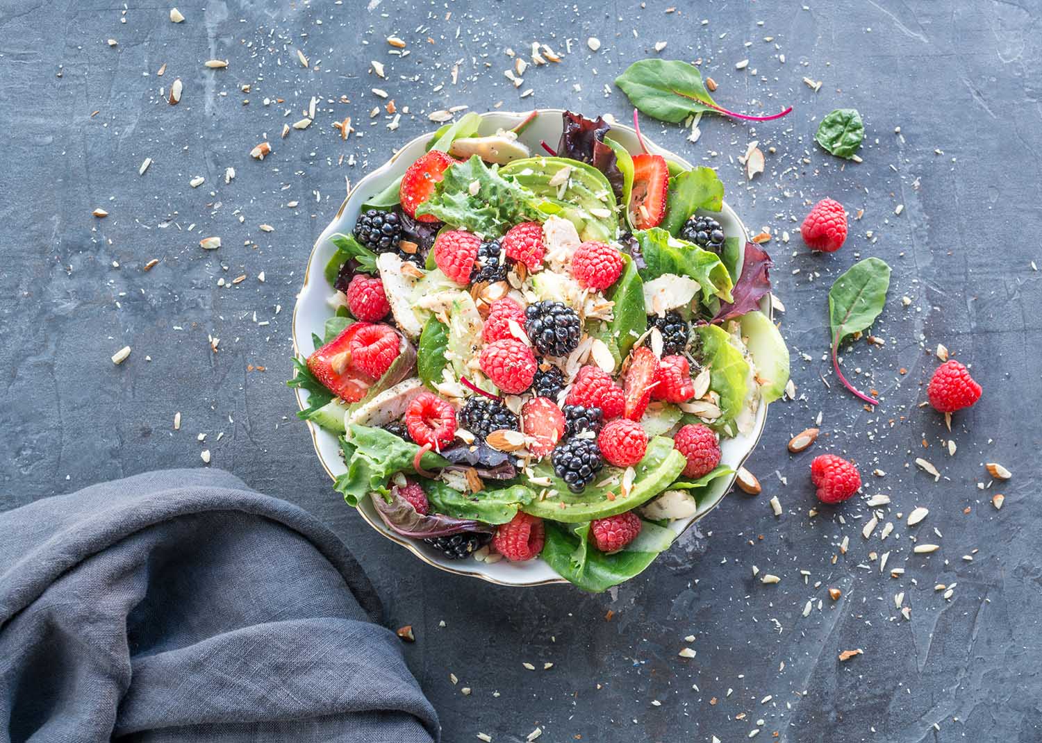 summer salad with chicken letuce veggies and mixed fruit