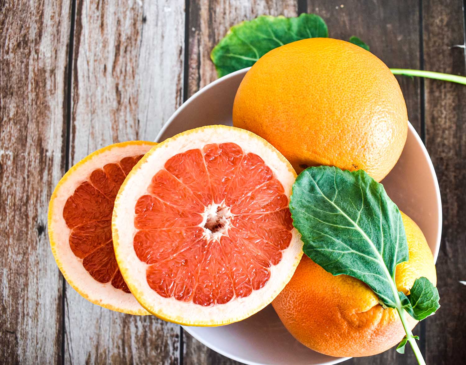 Grapefruits in bowl, juicy fruit