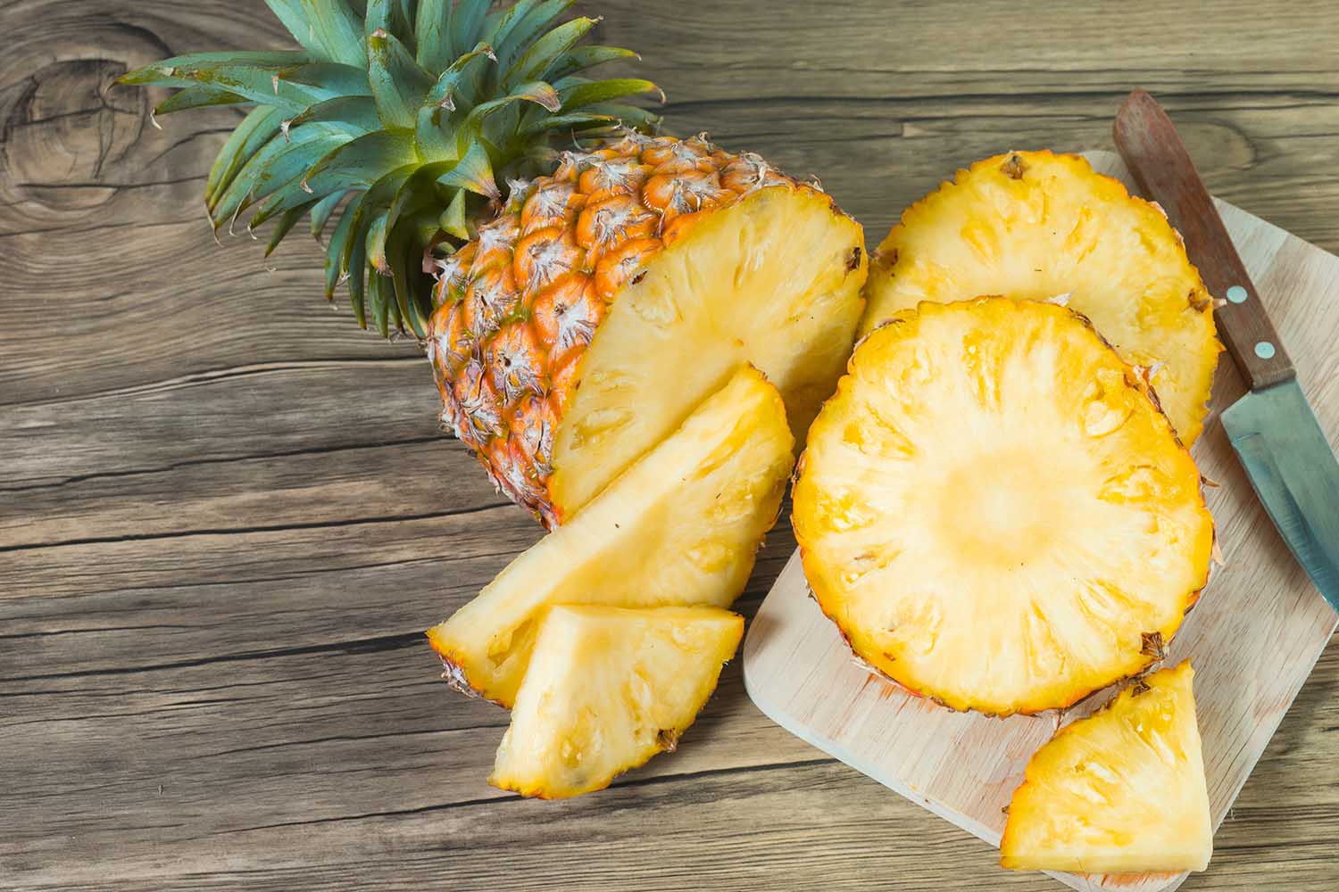 pineapple on the wood texture background