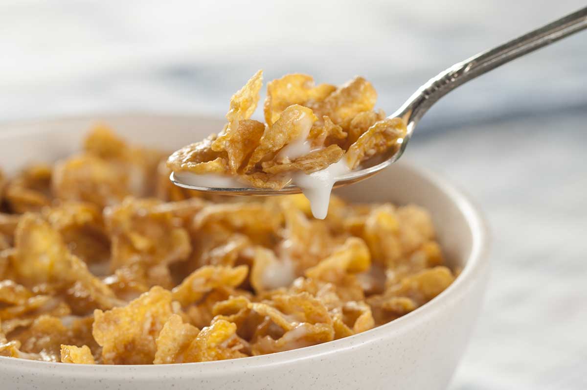 Cereal bowl and spoon with milk