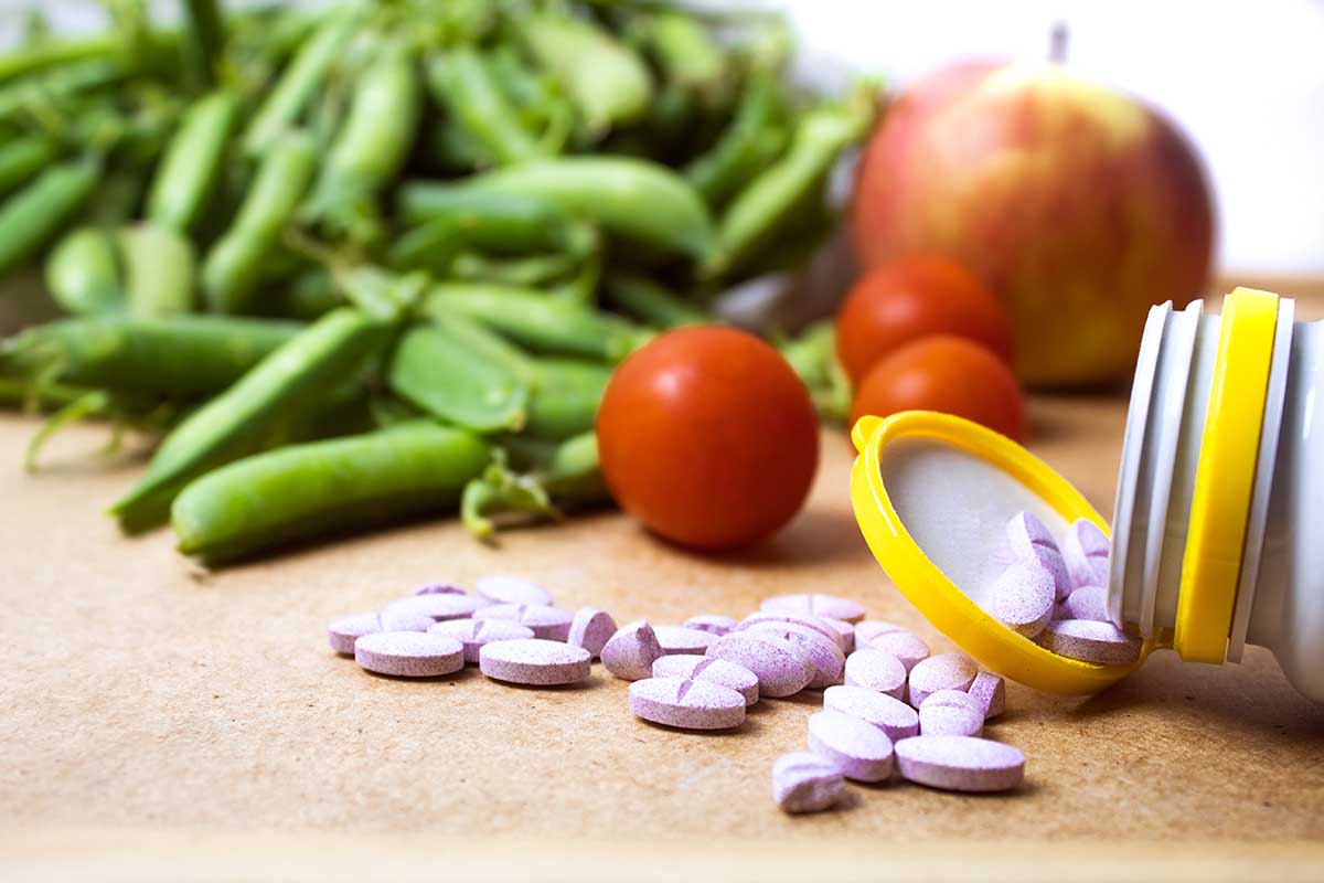 Selective focus. B12 supplements for a vegan and vegetarian diet. Concept, taking vitamins from food instead of in the form of tablet