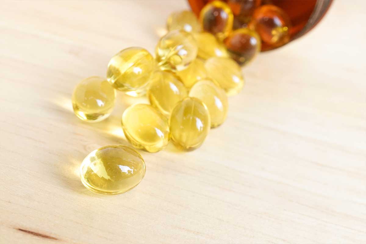 Pills spilling out of a bottle 